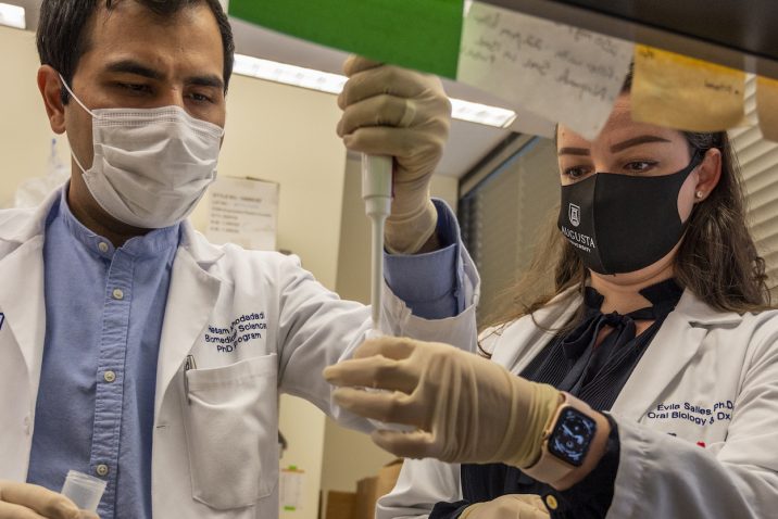 Researchers working in a lab.