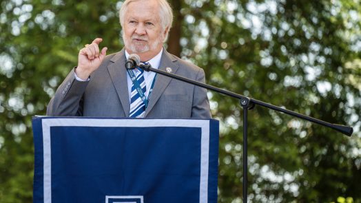 man standing a podium
