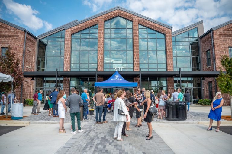 people standing outside a building