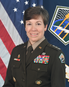 woman in front of American flag