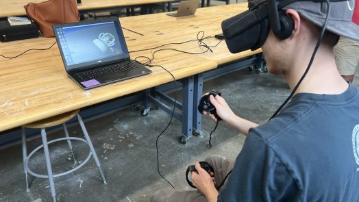 student uses virtual reality device