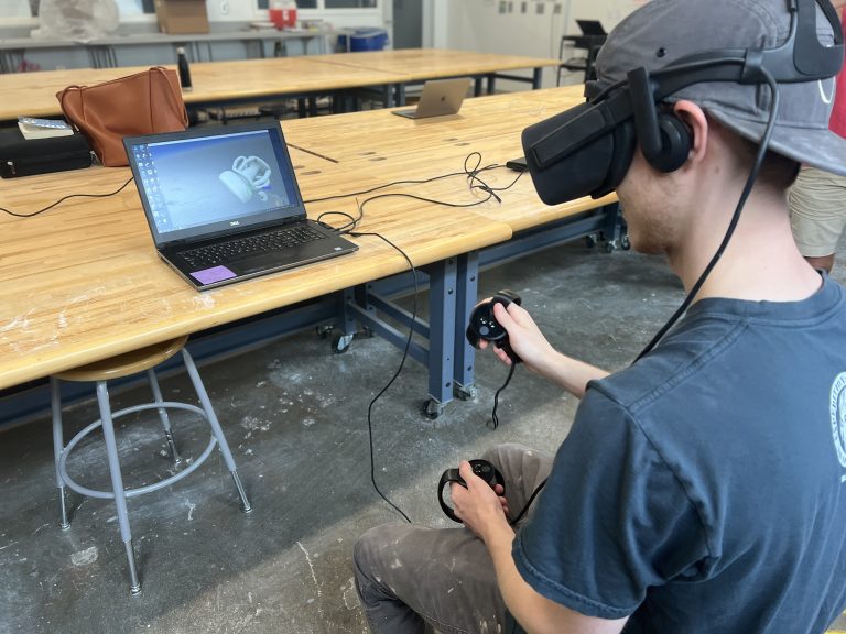 student uses virtual reality device