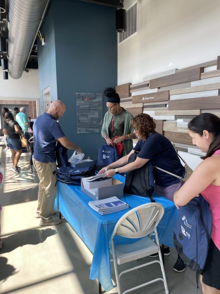 Families receive back to school supplies