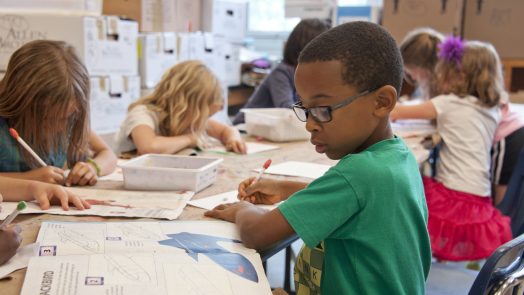 boys and girls in a classroom