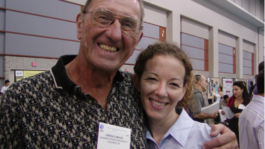 man and woman smiling