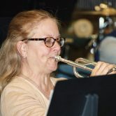 woman playing trumpet