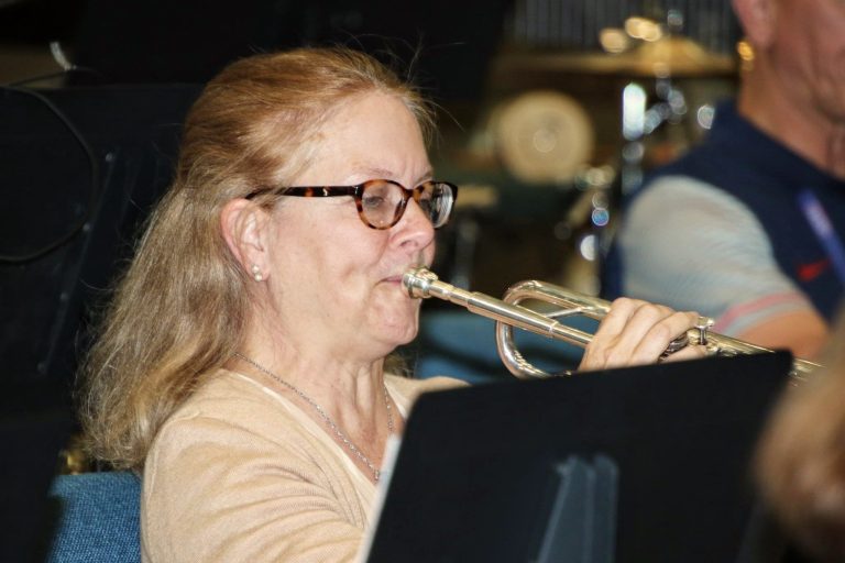 woman playing trumpet
