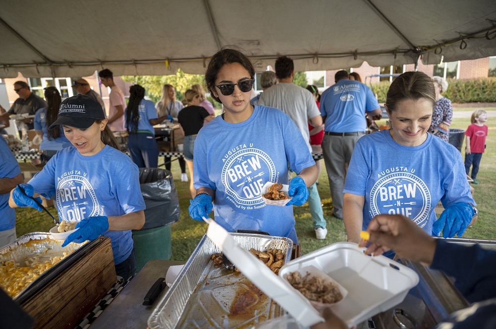 women serving food