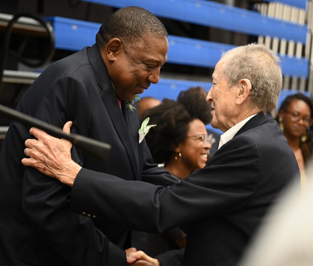 Man greeting another man