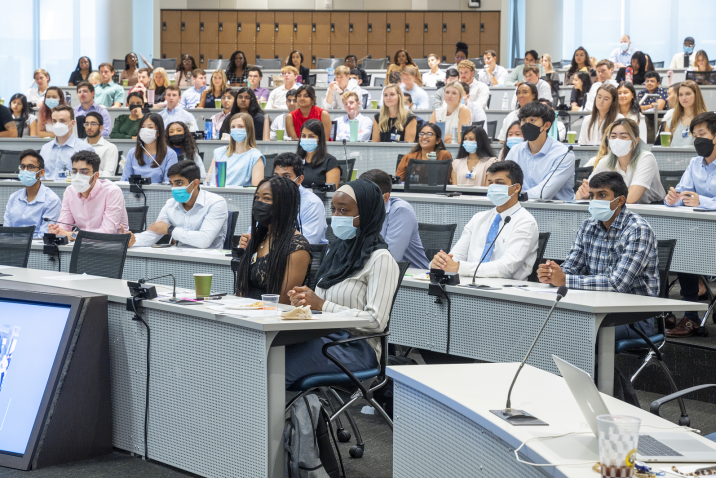 group of medical students listen to a presentation