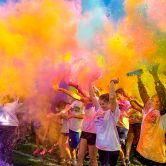 People throwing color in the air