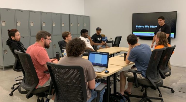 Students sitting around desks