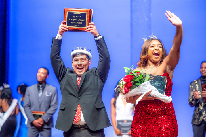 two pageant winners celebrate on stage