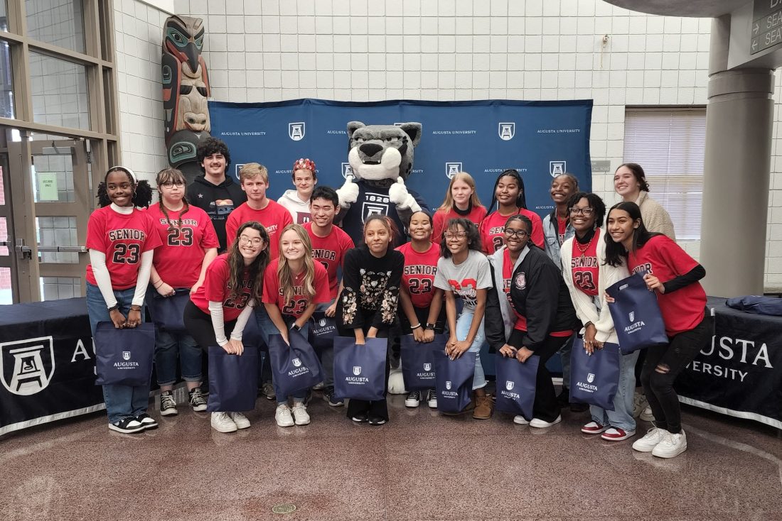 group of students with Jaguar mascot