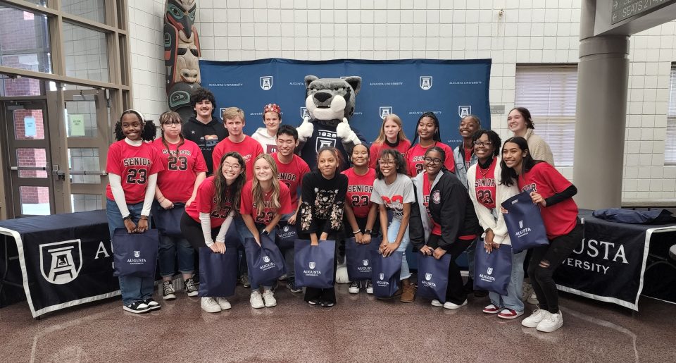 group of students with Jaguar mascot