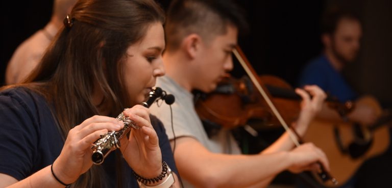 people playing musical instruments