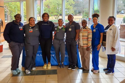 Nursing students and professor in University Hall