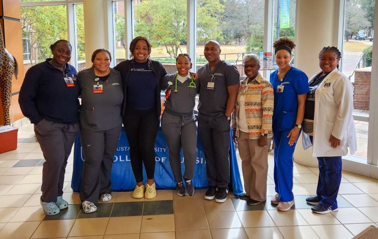Nursing students and professor in University Hall