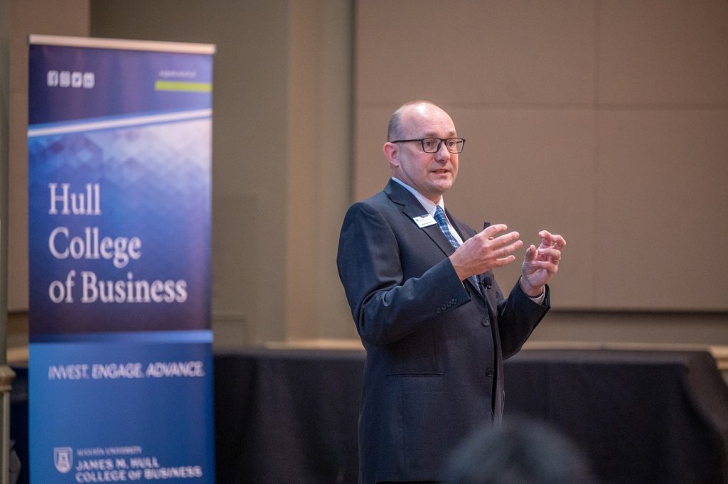 Man speaking with his hands out