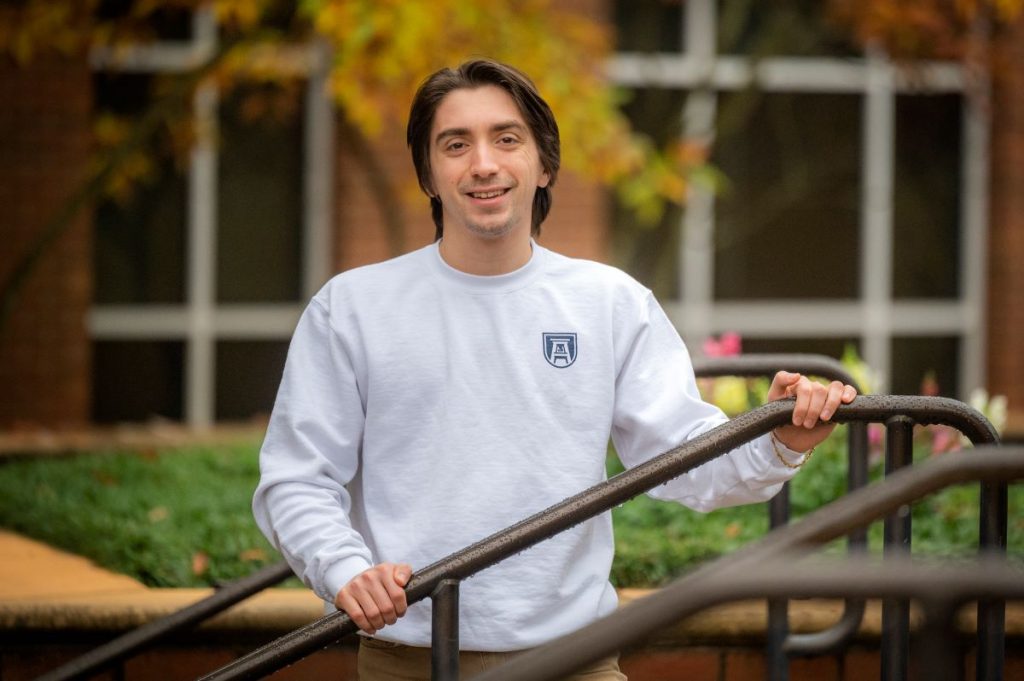 man in Augusta University long-sleeve T-shirt