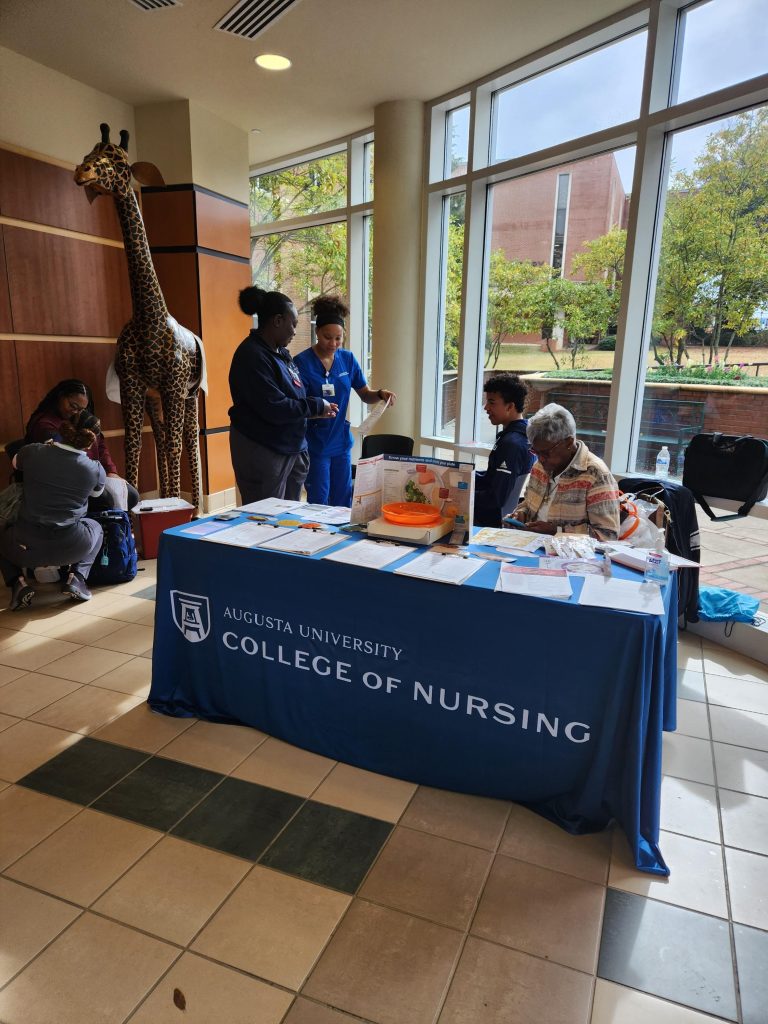 people at a College of Nursing tabling