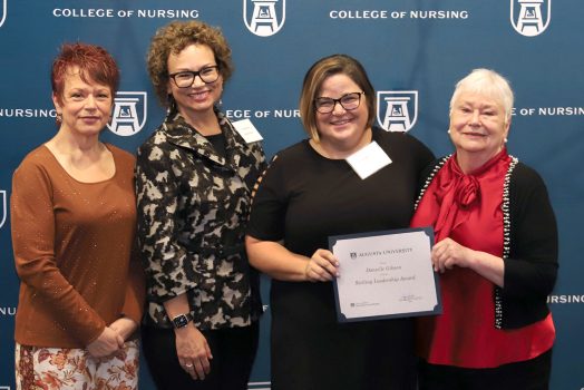 Women presenting award