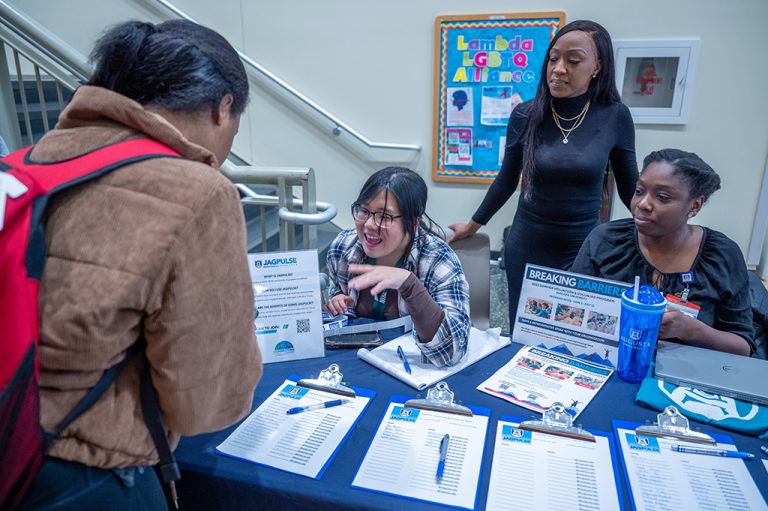 Four women near a table