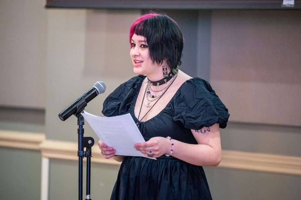 Woman giving public reading