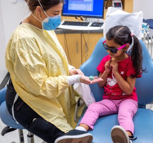 Pediatric dental patient with dentist