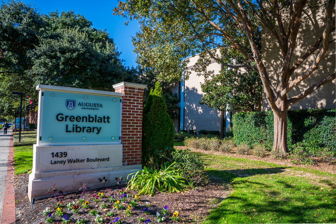 Greenblatt Library sign in front of building