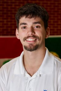 man smiling with white t-shirt