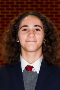 man wearing a suit, tie and vest