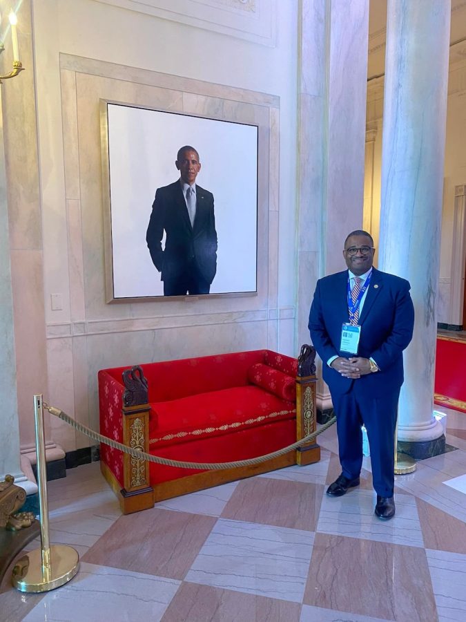 Mayor Johnson with portrait of Obama