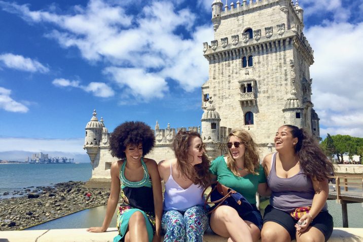 Four women pose overseas for their study abroad program