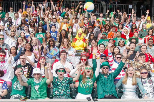 Fourth-year medical students sitting with excitement at SRP Park for Match Day 2023.