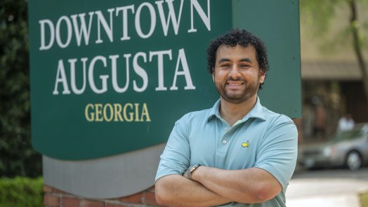 Man standing downtown