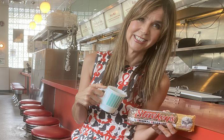 Woman in diner with candy and coffee