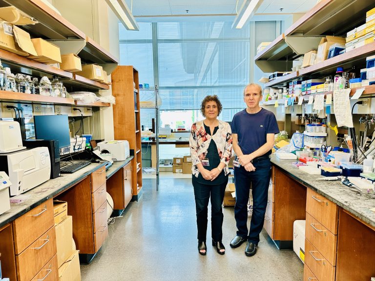 Man and woman standing in research lab