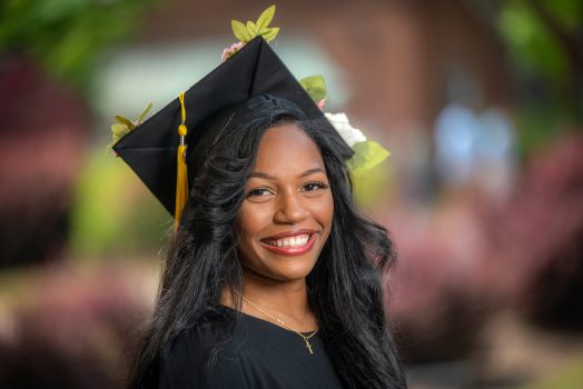 grad in cap and gown
