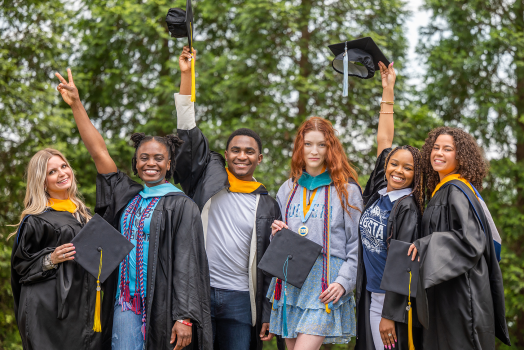 group of students wearing caps and gowns on Augusta University's Summerville Campus