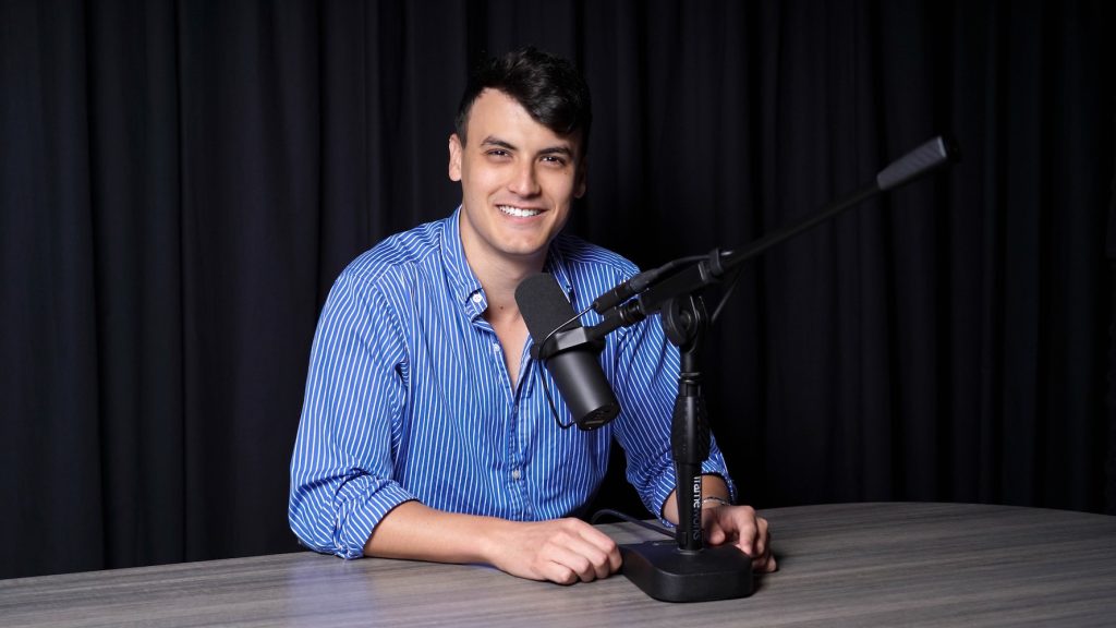 Man sitting at a Podcast