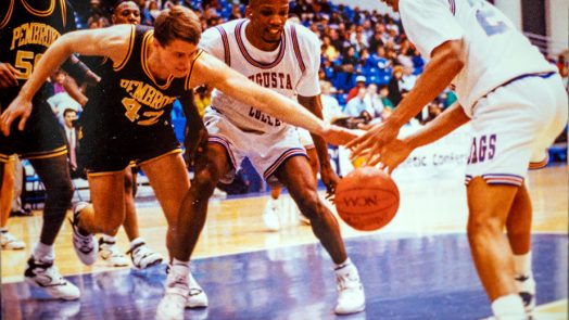 Men playing basketball