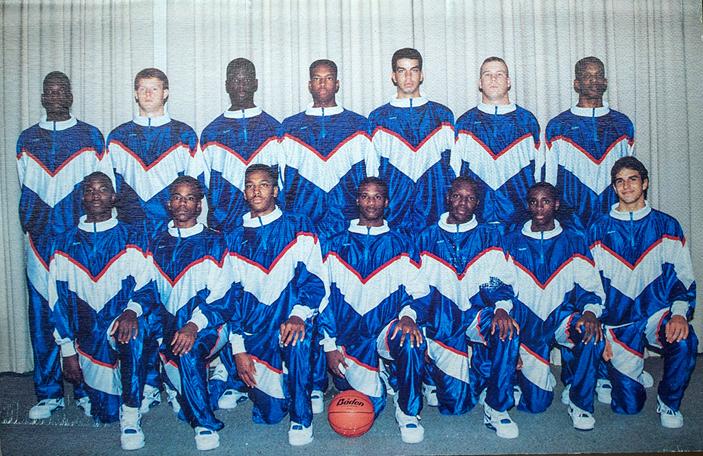 Men posing for a team basketball photo