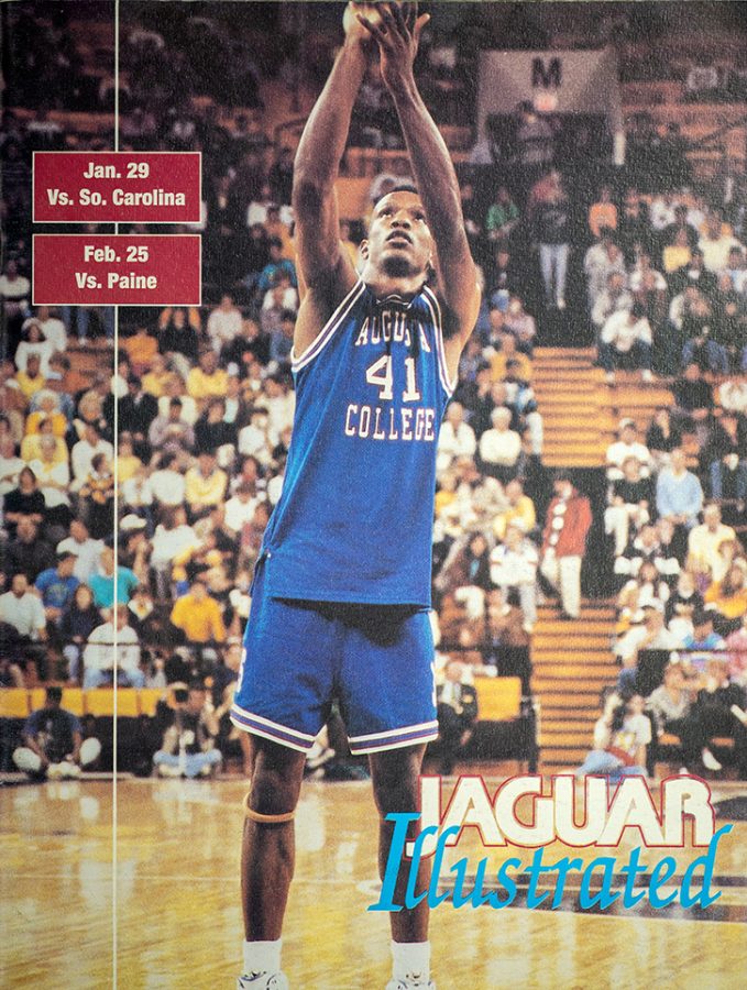 Media guide cover with man shooting a basketball