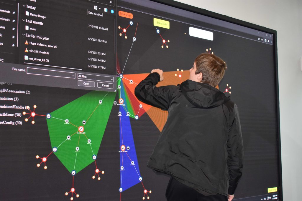 student at an electronic white board