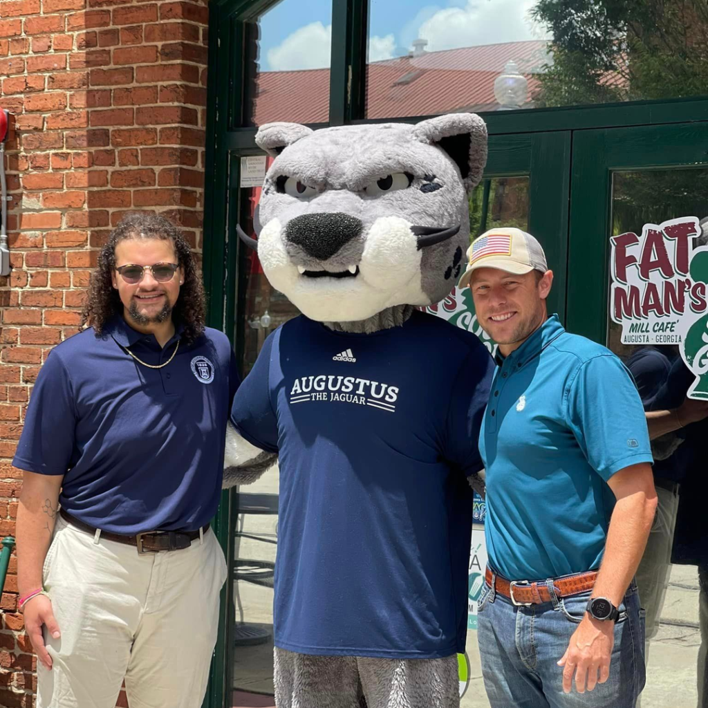 Two guys and a mascot