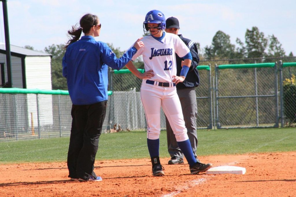 Female coach talking to her player