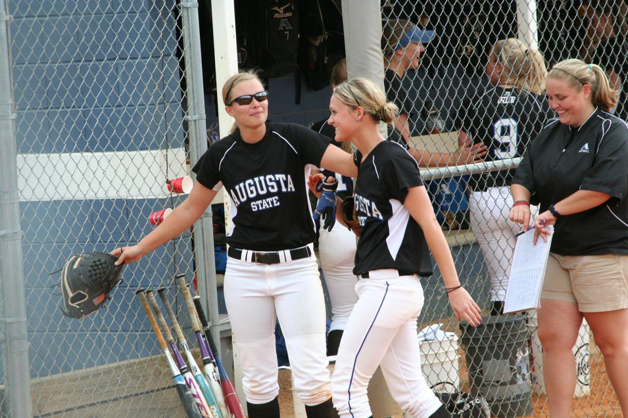 Woman celebrating with another woman