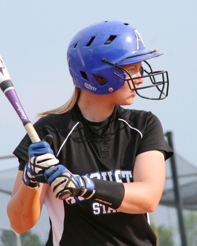 Woman preparing to swing a bat