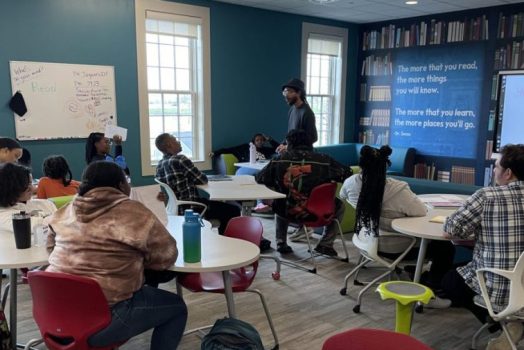 Poet teaching students